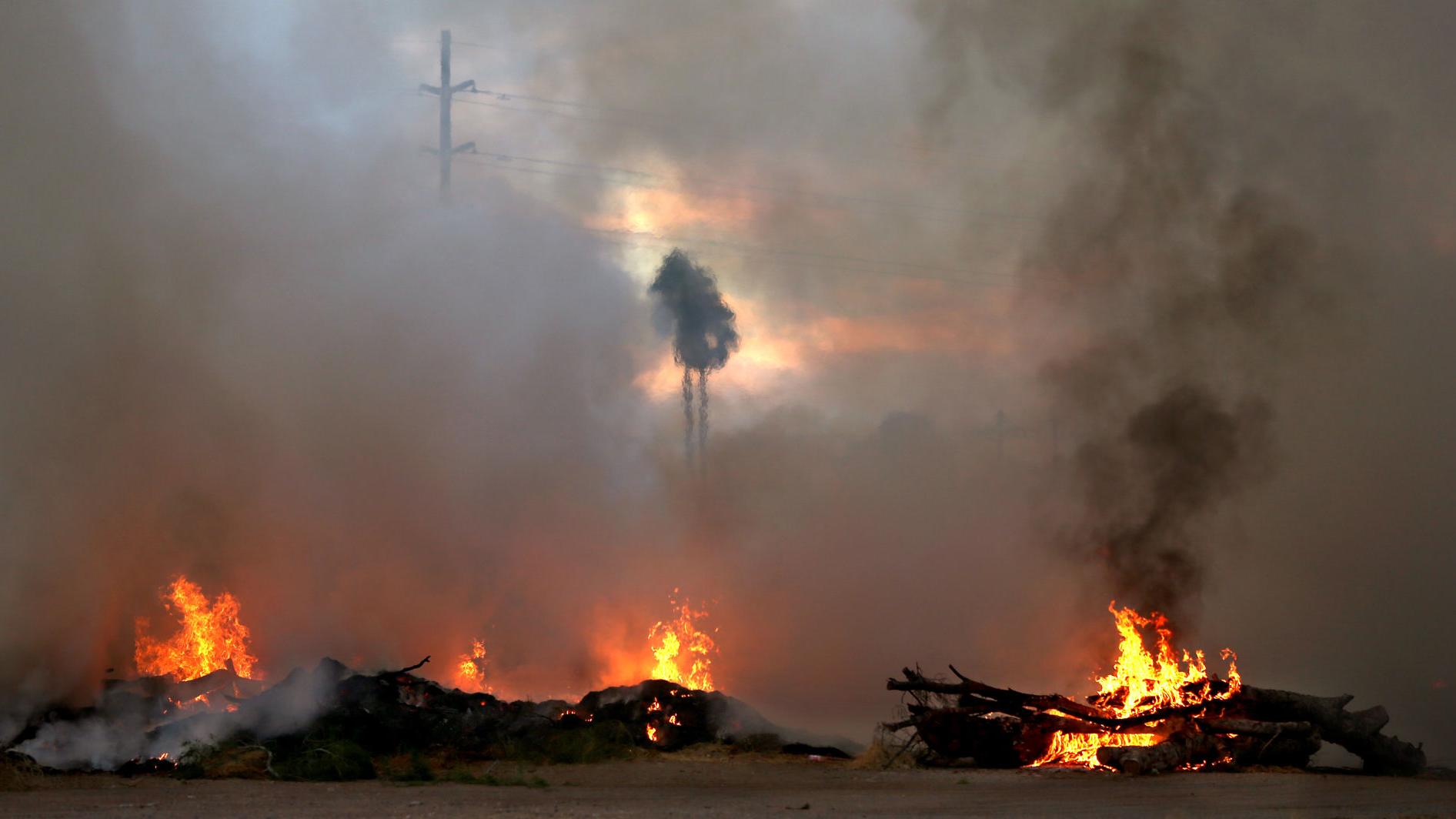 Tucson firefighters battling large brush fire on Evergreen cemetery property